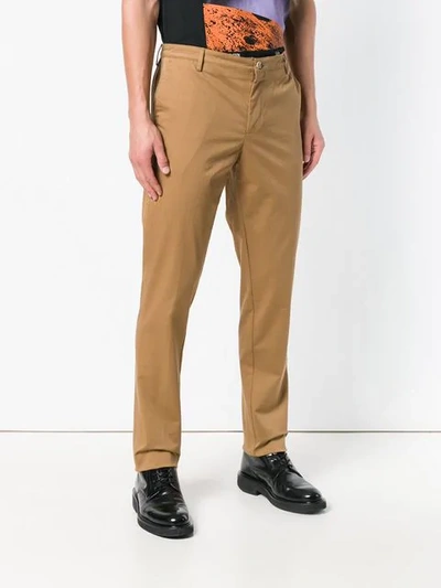 Shop Kenzo Embroidered Logo Chinos In Neutrals