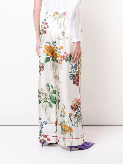 Shop Dolce & Gabbana Floral Palazzo Trousers In White