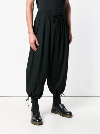 Shop Yohji Yamamoto Ballon Trousers In Black