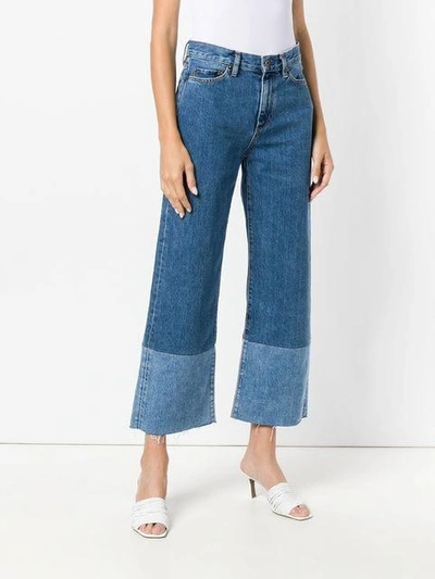 Shop Simon Miller Cropped Flared Jeans In Blue