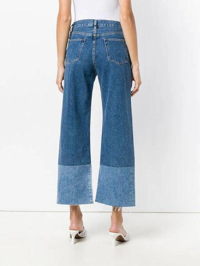 Shop Simon Miller Cropped Flared Jeans In Blue