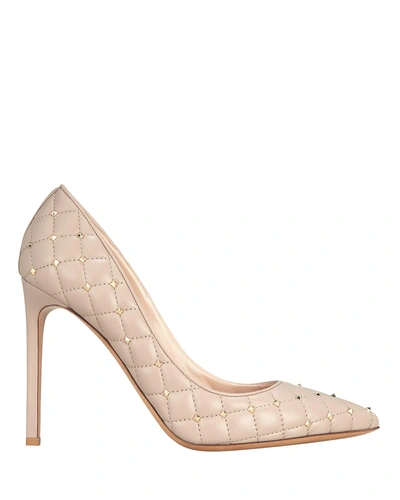 Shop Valentino Quilted Rockstud Leather Pumps In Beige