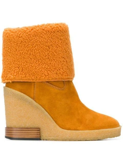 Shop Tod's Foldover Shearling Boots - Orange