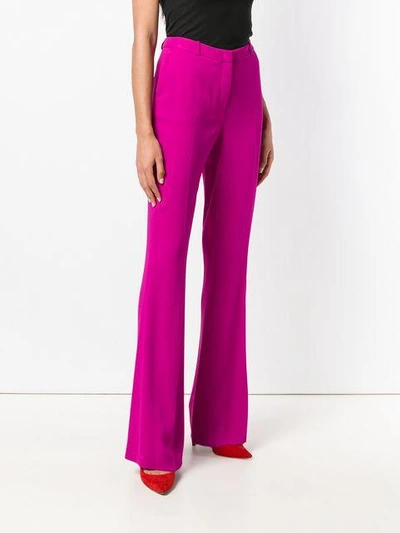 Shop Capucci High-waisted Flared Trousers - Pink