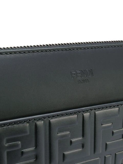Shop Fendi Logo Embossed Shoulder Bag In Black