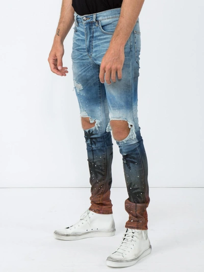 Shop Amiri Palm Thrasher Distressed Skinny Jeans