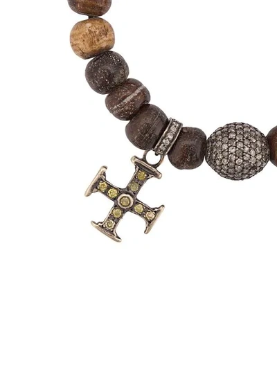 Shop Loree Rodkin Bone Bead Cross Bracelet In Metallic