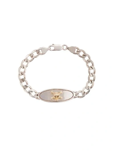 18kt gold skull chain link bracelet