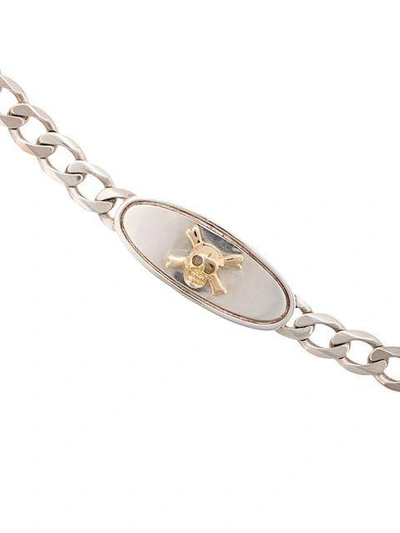 18kt gold skull chain link bracelet