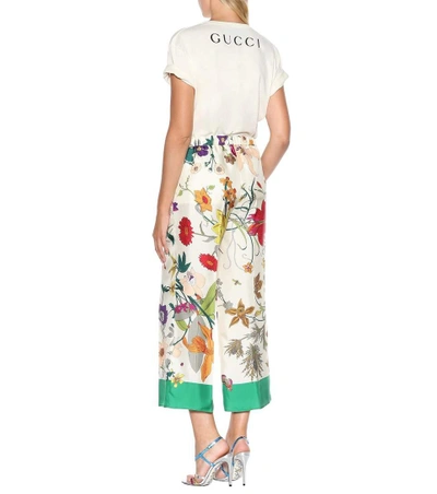 Shop Gucci Floral-printed Silk Pants In Multicoloured