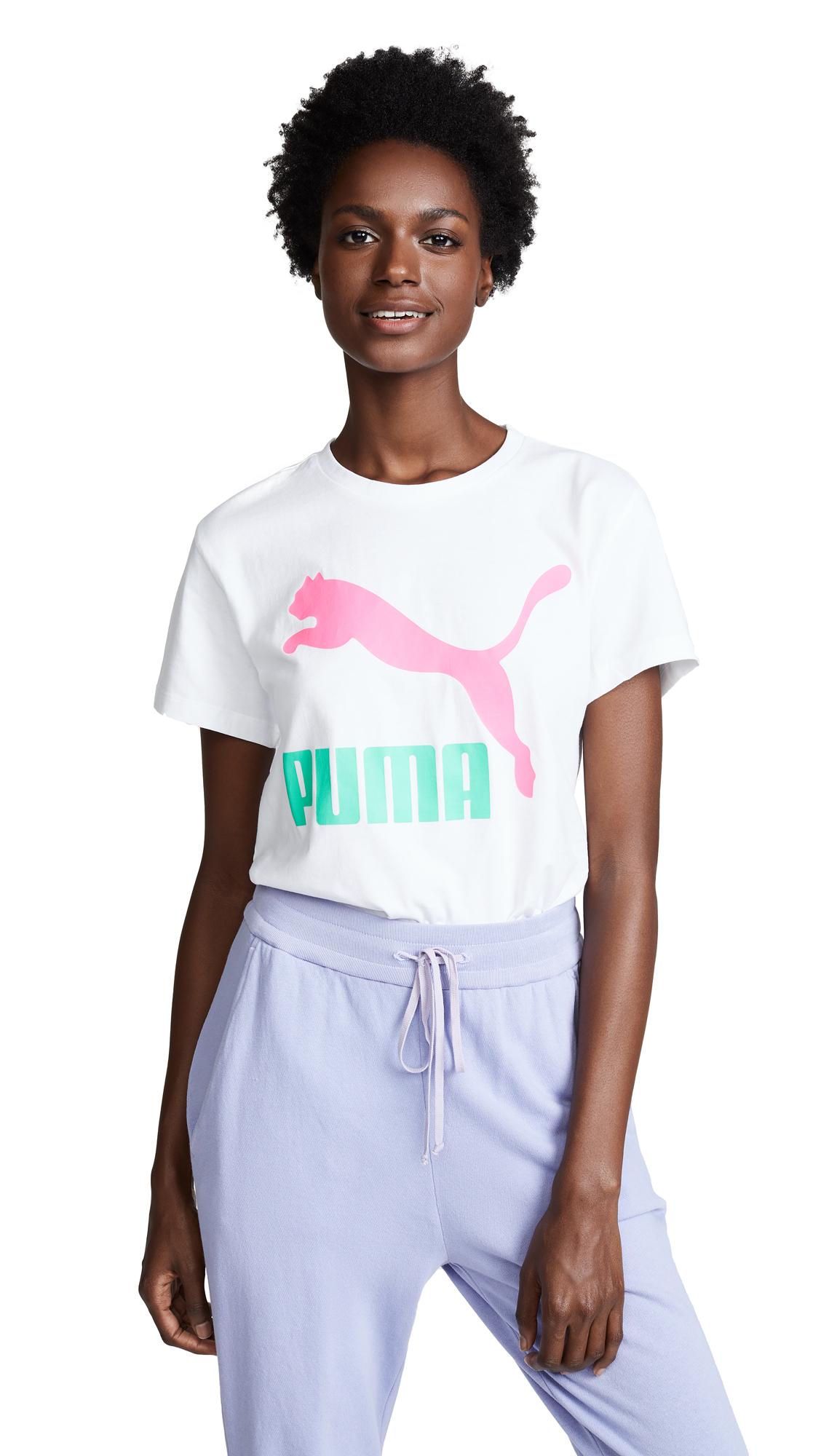 white and pink puma shirt