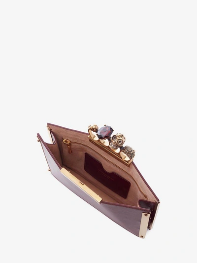 Shop Alexander Mcqueen Small Jeweled Four-ring Clutch In Carmine