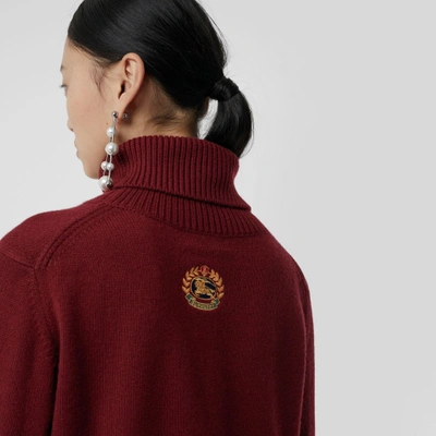 Shop Burberry Embroidered Crest Cashmere Roll-neck Sweater In Red