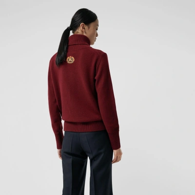 Shop Burberry Embroidered Crest Cashmere Roll-neck Sweater In Red