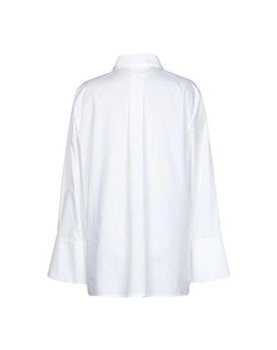 Shop Escada Sport Solid Color Shirts & Blouses In White