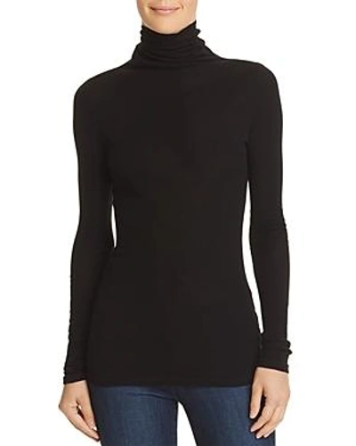 Shop Theory Ribbed Turtleneck Top In Black