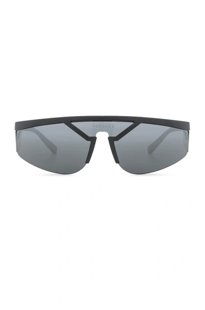 Shop Versace Wrap Shield Sunglasses In Matte Black