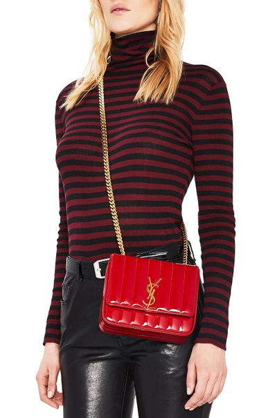 Shop Saint Laurent Small Supple Monogramme Vicky Chain Bag In Red