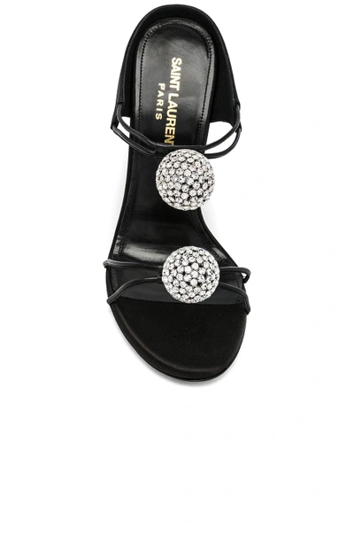 Shop Saint Laurent Satin Pom Pom Strap Pierre Sandals In Black