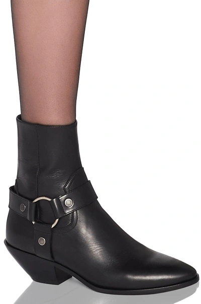 Shop Saint Laurent West Strap Ankle Boots In Black