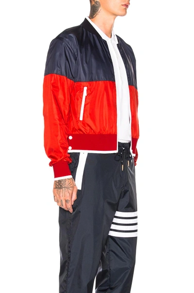 Shop Thom Browne Bicolor Bomber Jacket In Blue,red,. In Navy & Red
