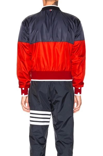 Shop Thom Browne Bicolor Bomber Jacket In Blue,red,. In Navy & Red