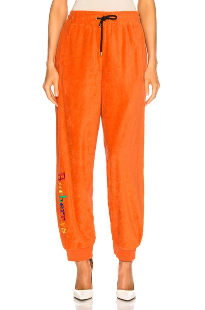Shop Burberry Rainbow Logo Sweatpants In Orange