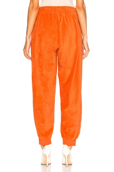 Shop Burberry Rainbow Logo Sweatpants In Orange