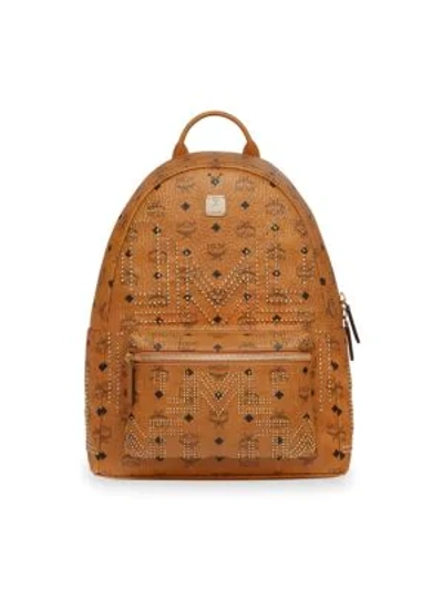 Shop Mcm Medium Stark Gunta Stud Visetos Backpack In Cognac