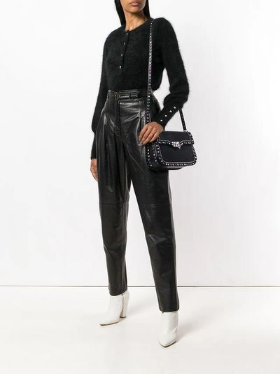 Shop Valentino Garavani Rockstud Rolling Shoulder Bag In Black