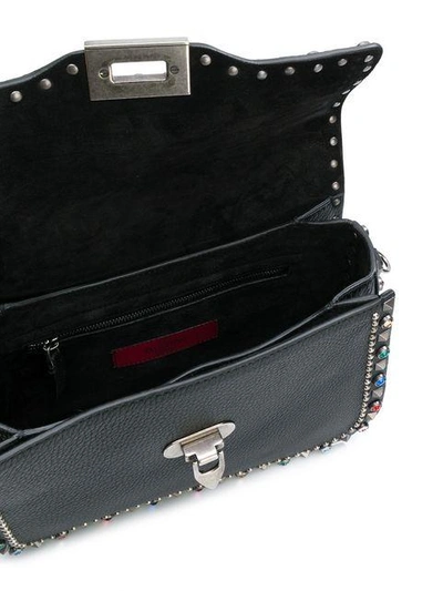 Shop Valentino Garavani Rockstud Rolling Shoulder Bag In Black