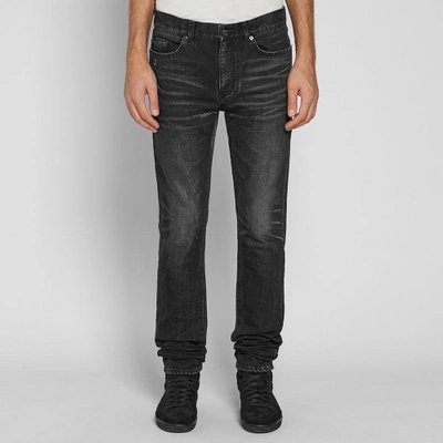 Shop Saint Laurent Distressed Skinny Jean In Black