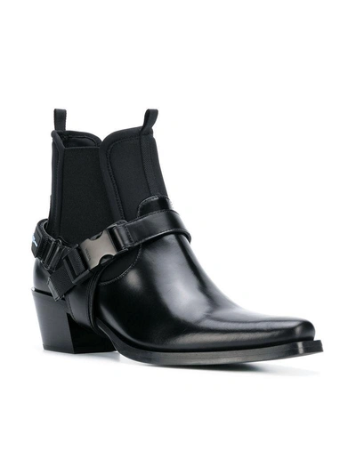 Shop Prada Strap Buckle Boots In Black
