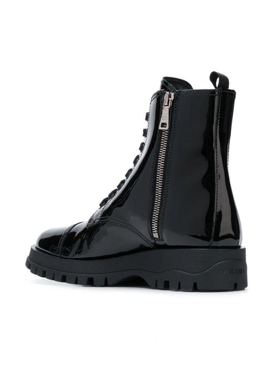 Shop Prada Varnish Lace Up Boots In Black