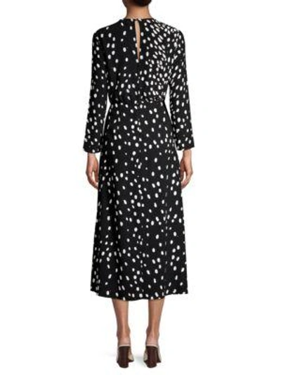 Shop Rixo London Alice Dotted Silk Midi Dress In Black Leopard