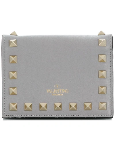 Shop Valentino Garavani Compact Rockstud Wallet - Grey