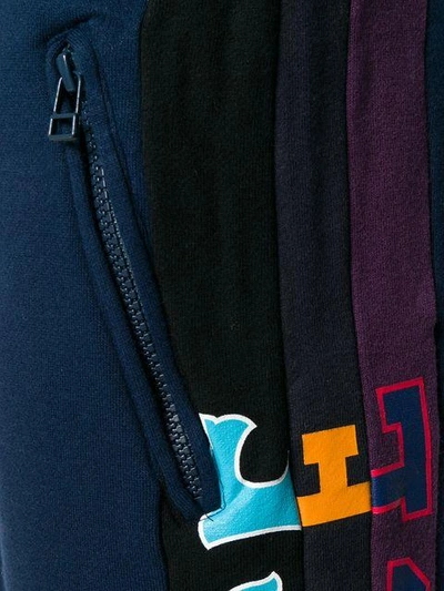 Shop Facetasm Cropped Logo Track Pants - Blue