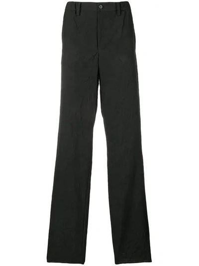 Shop Issey Miyake Men Wrinkled Effect Trousers - Black