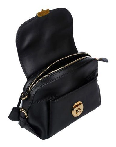Shop Ferragamo Cross-body Bags In Black