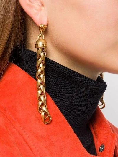 Shop Versace Twisted Chain Earrings In Metallic