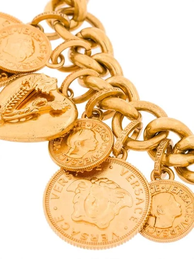 Shop Versace Coin Charm Bracelet In Metallic