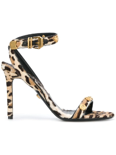 Shop Versace Leopard Print Sandals - Brown