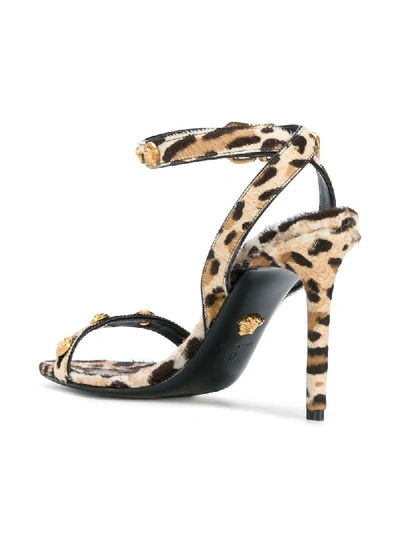 Shop Versace Leopard Print Sandals - Brown