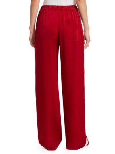 Shop Elizabeth And James Kelly Crepe Track Trousers In Ruby White