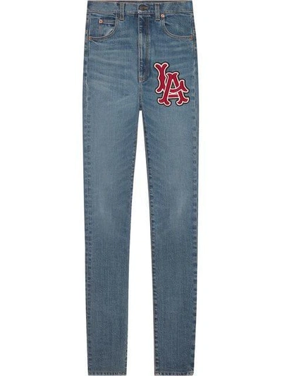 Shop Gucci Skinny Denim Trousers With La Angels™ Patch In Blue