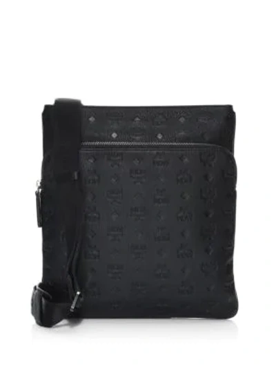 Shop Mcm Ottomar Monogram Leather Messenger Bag In Black
