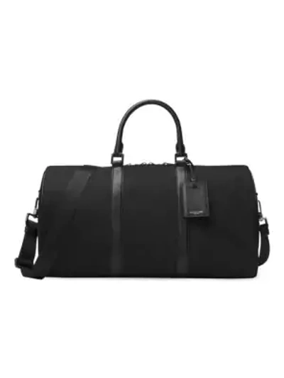 Shop Michael Kors Tubular Duffle Bag In Black