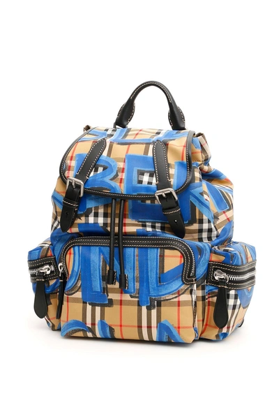 Shop Burberry Medium Rucksack With Graffiti Logo In Blackceleste