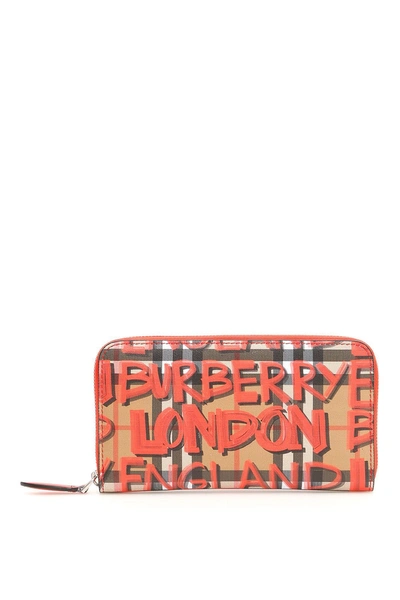 Shop Burberry Graffiti Zip-around Wallet In Red