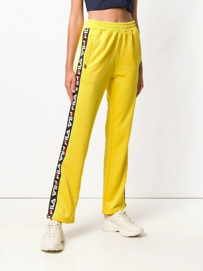 Shop Fila Logo Stripe Track Pants In Yellow